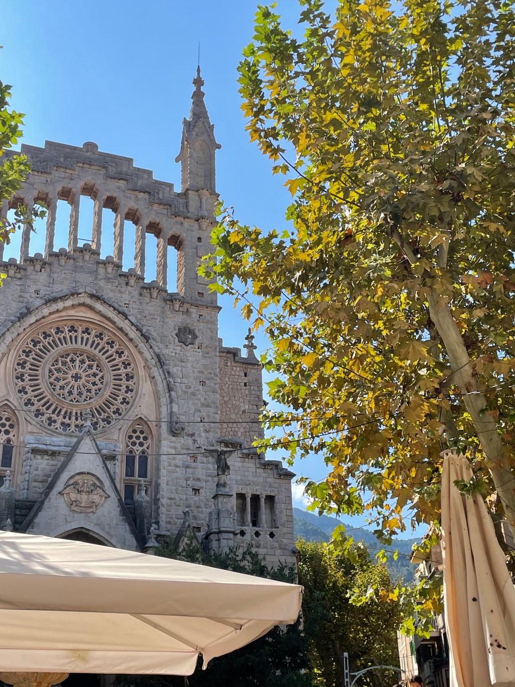 View of the church of Sant Bartomeu of Soller in the autumn sun