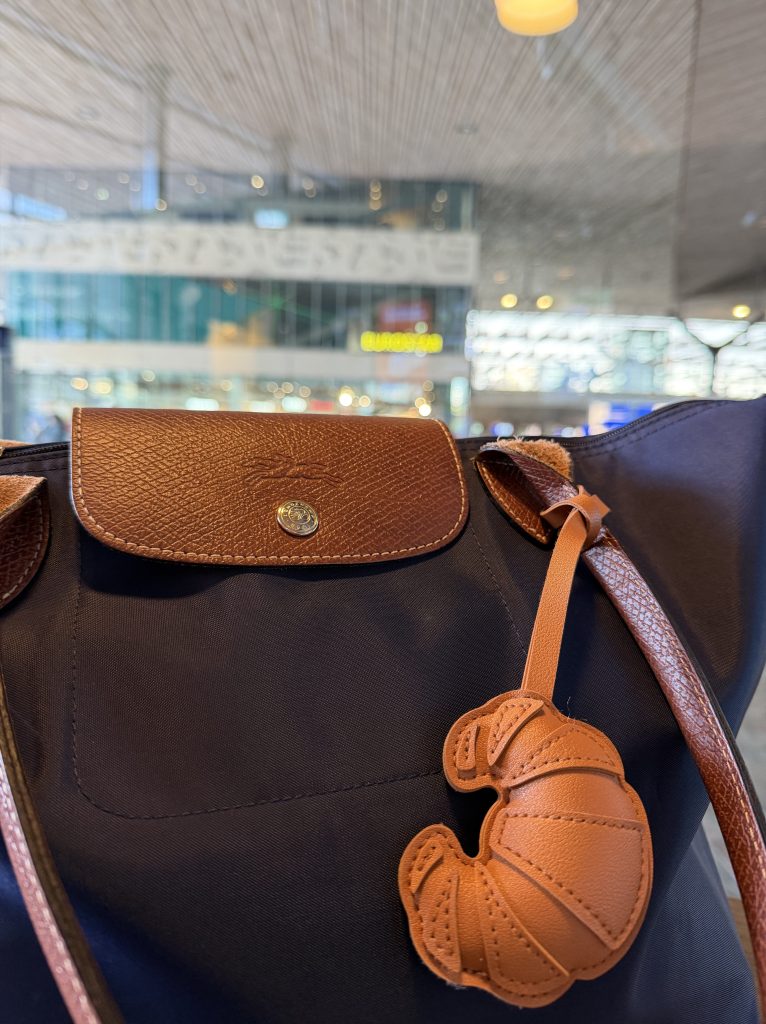 Tote bag with international train station in the background