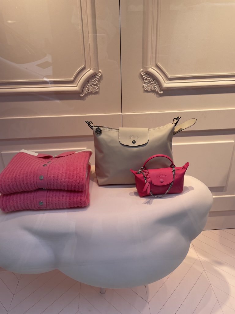 Shop display of Longchamp totes